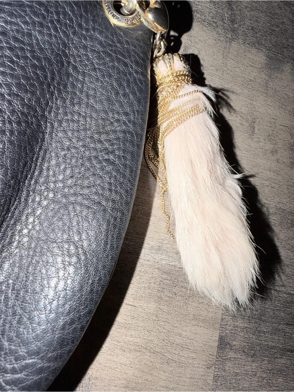 Vintage Juicy Couture Black Pebbled Leather Shoulder Bag with rabbit foot Tassel